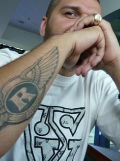 Stylish Man with Tattoo - wallpaper preview