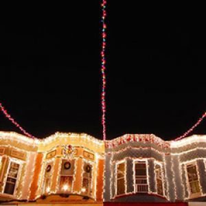 Christmas lights adorn the row houses