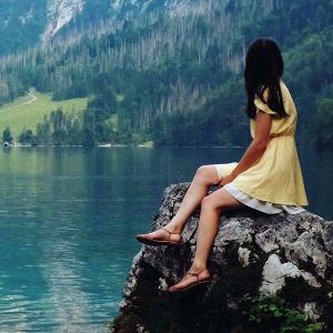 Girl at the mountain lake